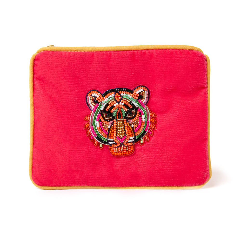 The My Doris Pouch in pink tiger tiger beading with beaded trim around the edges