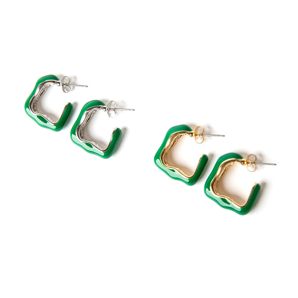 The Nadine earrings in emerald green with a quirky shape and butterfly back fastenings