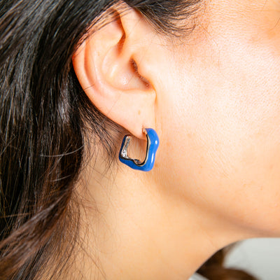 The Nadine Earrings in royal blue, available in gold and silver plating