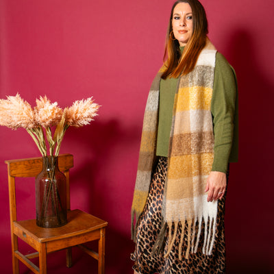 The Mustard yellow Nelly Check Scarf with hints of cream and brown running throughout