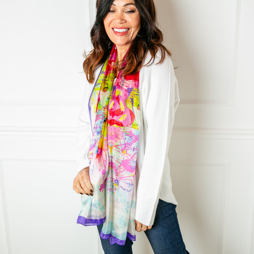 The Neon Bloom Silk Scarf which is perfect for accessorising a simple winter outfit