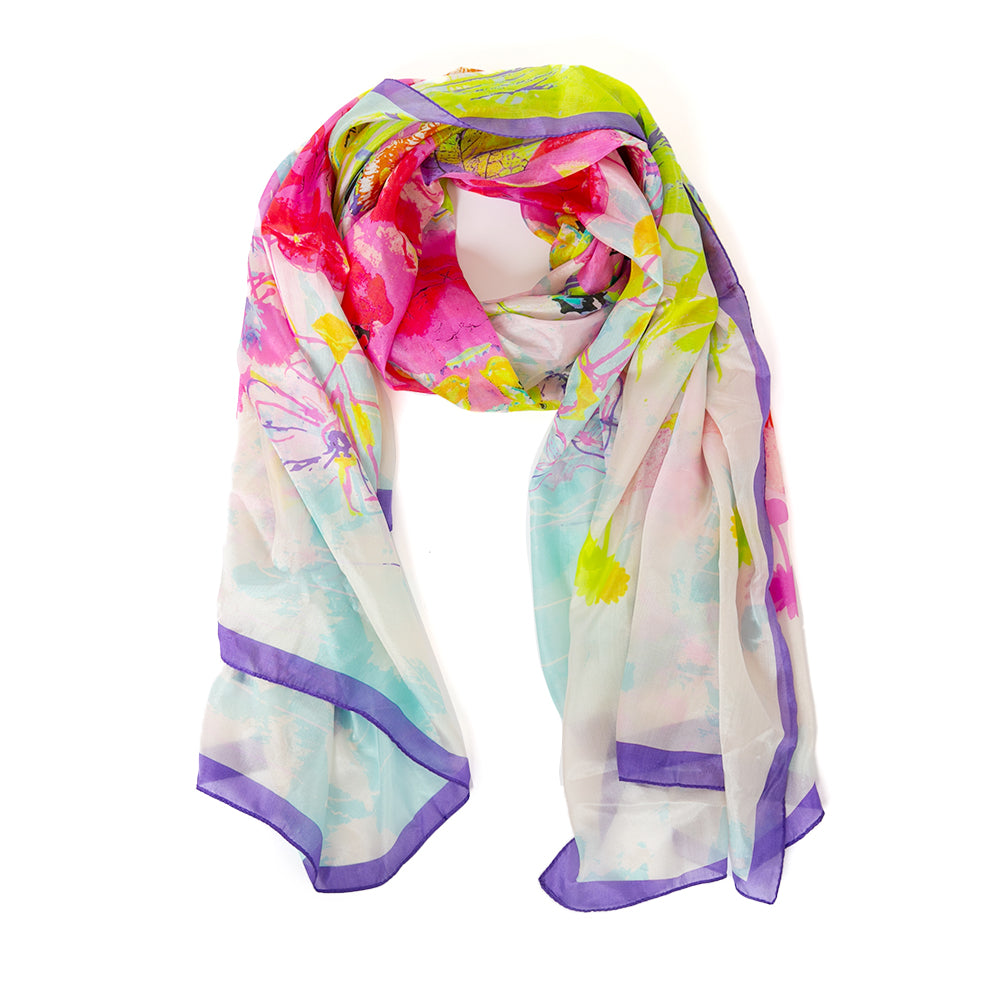 The Neon Bloom Silk Scarf which features a beautiful explosive abstract floral print design with a purple trim around the edges