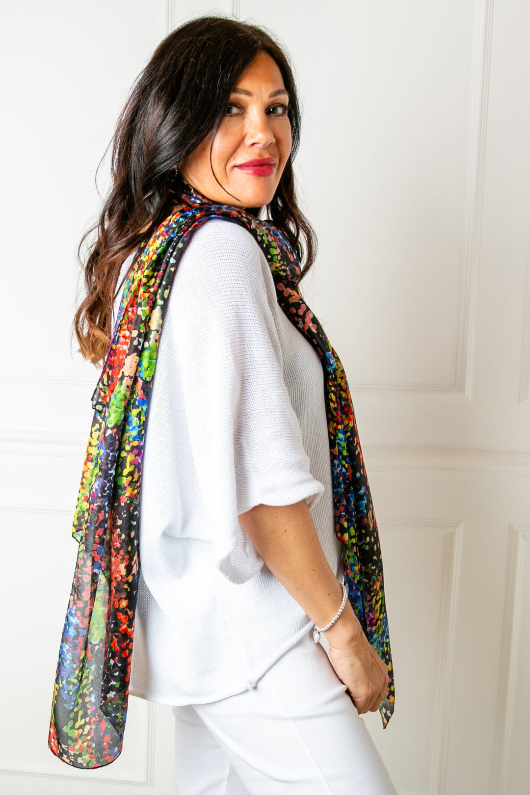 The Neon Blossom Silk Scarf which can be styled in lots of different ways