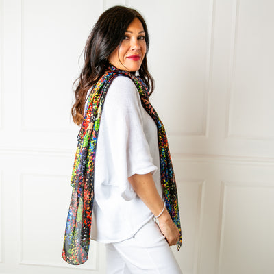 The Neon Blossom Silk Scarf which can be styled in lots of different ways