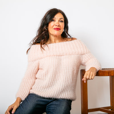 The Off Shoulder Jumper in baby pink with long sleeves