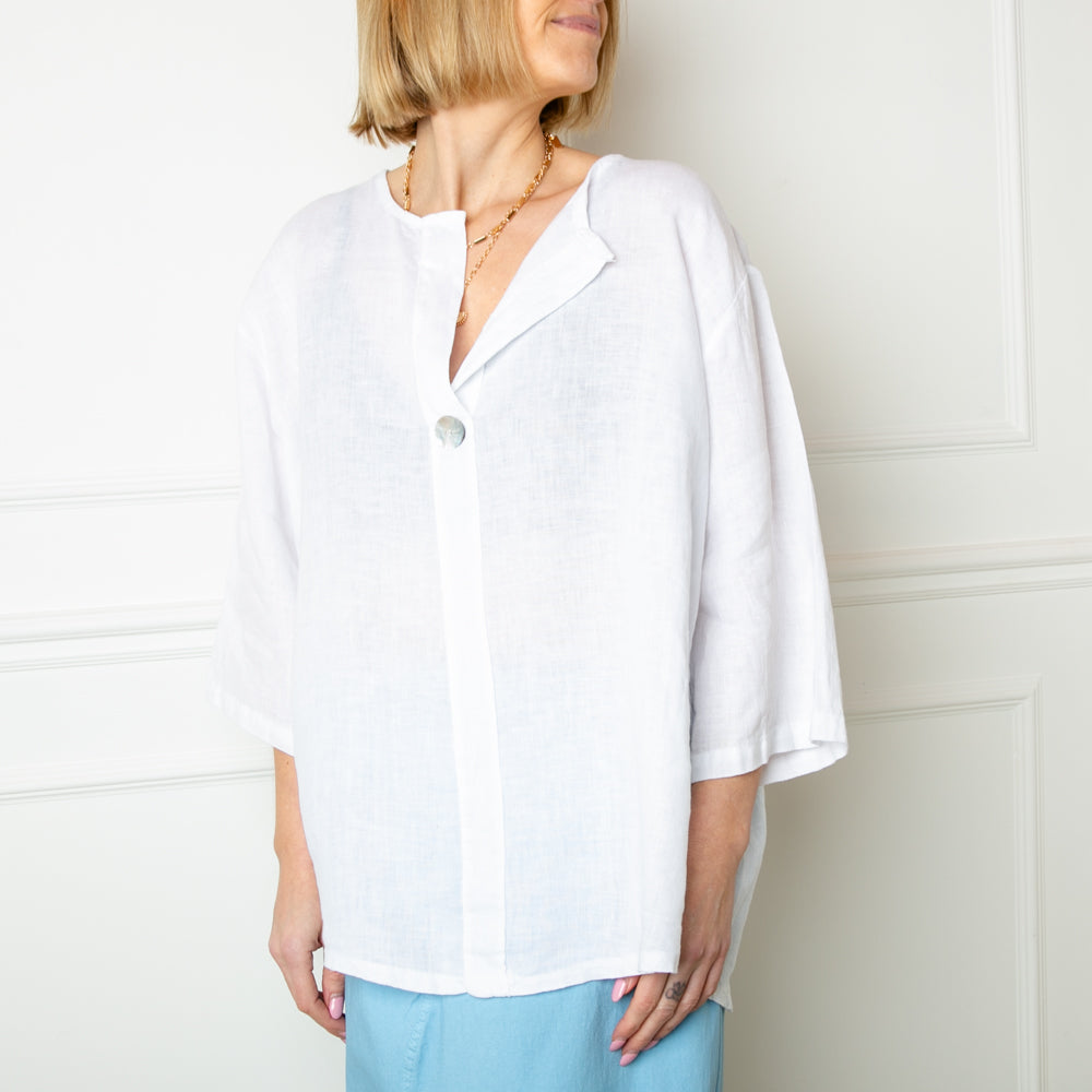 The white One Button Linen Top made from a lightweight relaxed fit linen material, perfect for summer