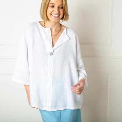 The white One Button Linen Top in a loose casual relaxed fit with 3/4 length sleeves