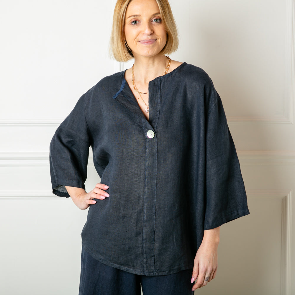 The navy blue One Button Linen Top in a loose casual relaxed fit with 3/4 length sleeves