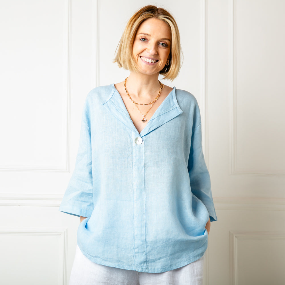 The sky blue One Button Linen Top made from a lightweight relaxed fit linen material, perfect for summer
