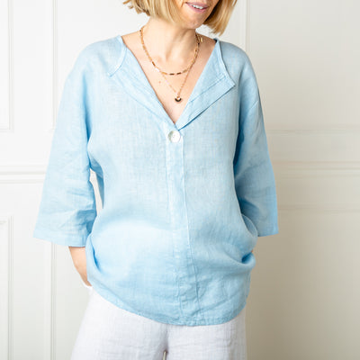 The sky blue One Button Linen Top in a loose casual relaxed fit with 3/4 length sleeves