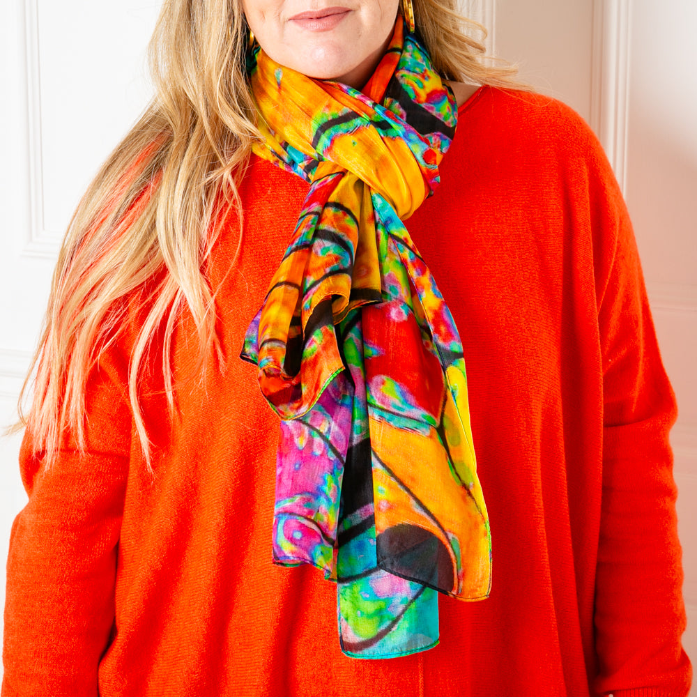 The Orange Oil Spill Silk Scarf made from 100% pure luxury silk scarf
