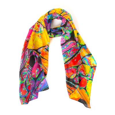 The Orange Oil Spill Silk Scarf with shades of yellow blue red purple pink and black