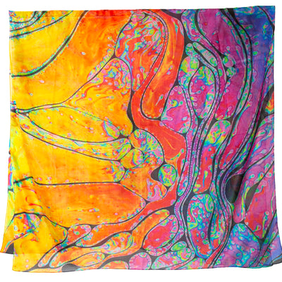 The Orange Oil Spill Silk Scarf featuring a vivivd multicolour swirl pattern