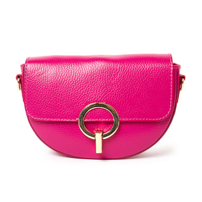 The fuchsia pink Oslo Leather Crossbody Handbag with an O shaped gold metal clasp