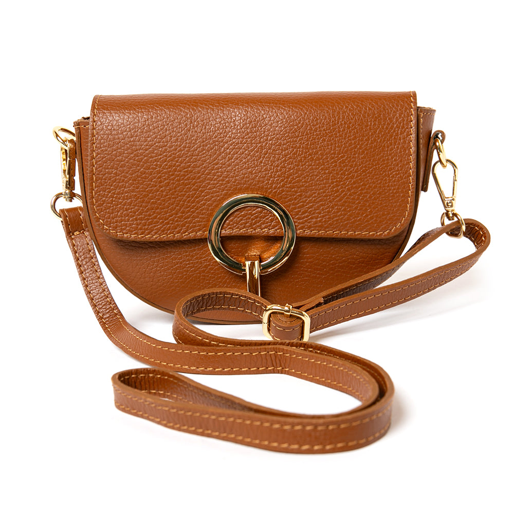 The tan brown Oslo Leather Crossbody Handbag with a long adjustable strap for wearing across the body