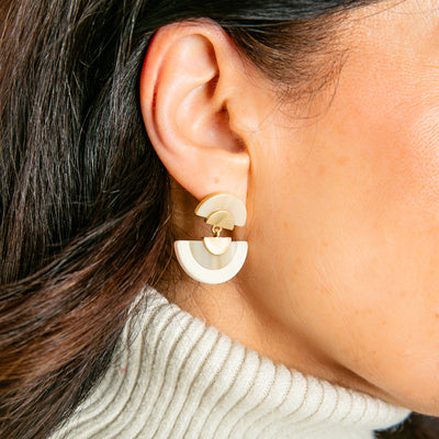 The Otto Earrings in cream and gold with a stud back fastening. Perfect for making a statement