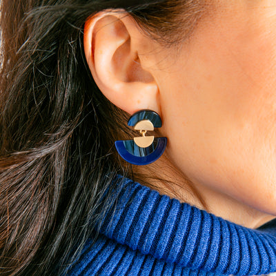 The Otto Earrings in navy and gold with a stud back fastening. Perfect for making a statement