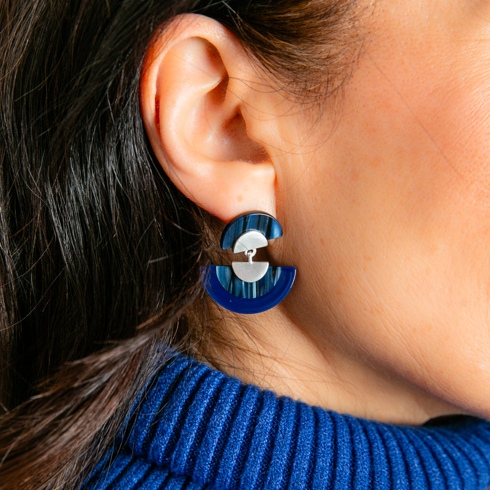 The Otto Earrings in navy and silver with a stud back fastening. Perfect for making a statement