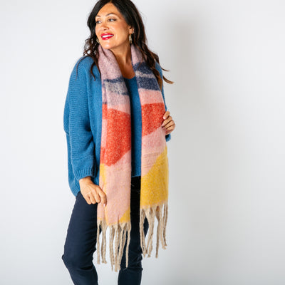 The Ozzy Multicolour Scarf in Cinnamon made from a super soft chunky knit with tassels at either end