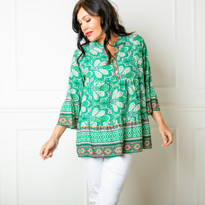 The green Paisley Blouse with a tiered bodice for a relaxed fit