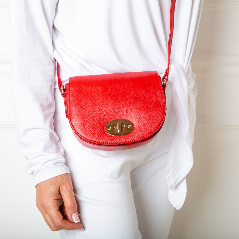 The Paris Leather Handbag in poppy red with a long, leather adjustable strap