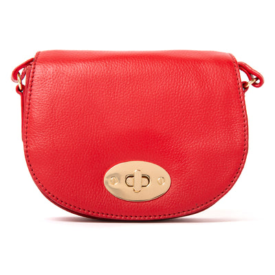 The Paris Leather Handbag in Poppy Red with gold hardware including a twisty metal clasp fastening