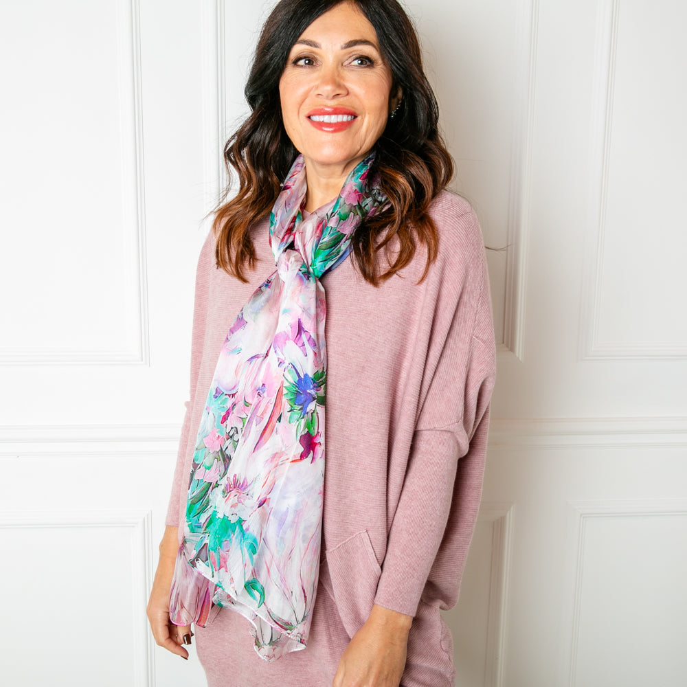 The Pastel Dahlia Silk Scarf which can be worn in many ways to finish an outfit