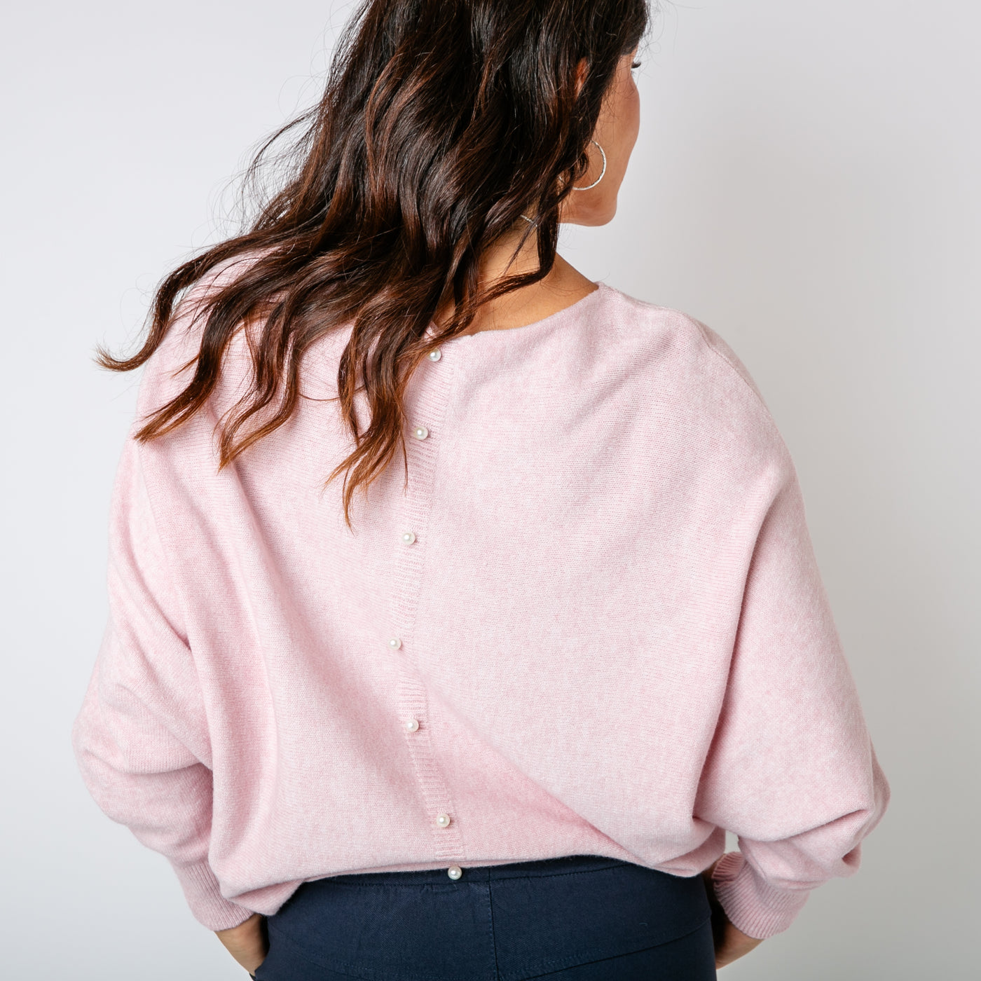 The dusky pink Pearl Back Jumper relaxed batwing sleeves for a comfy fit