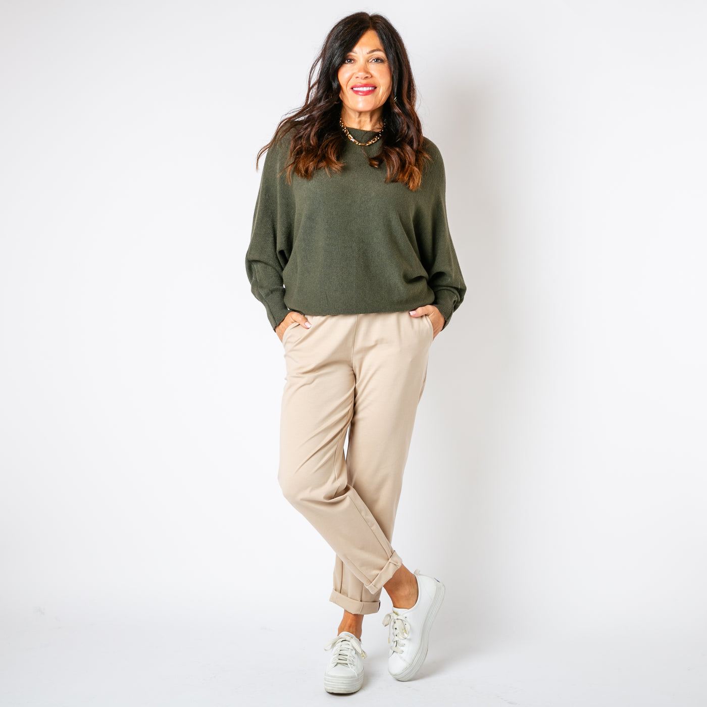 The khaki green Pearl Back Jumper relaxed batwing sleeves for a comfy fit