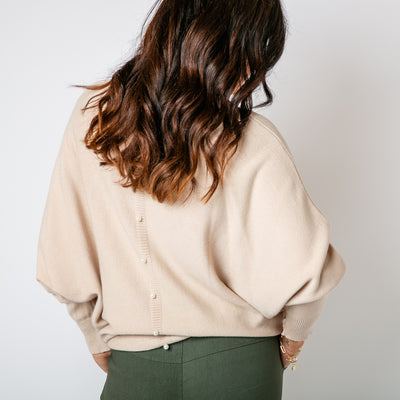 The oatmeal brown Pearl Back Jumper relaxed batwing sleeves for a comfy fit