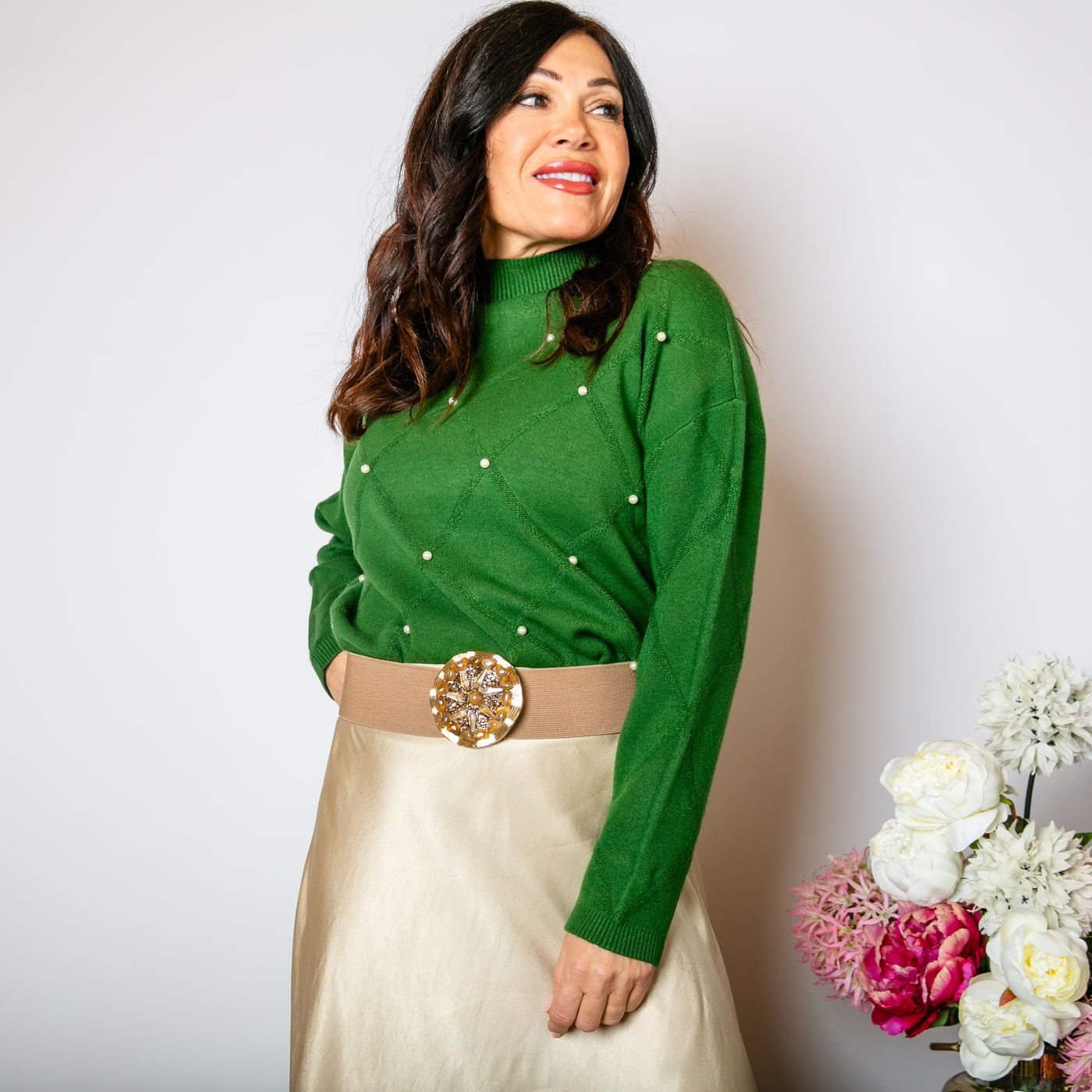 The emerald green Pearl Detail Mock Neck Jumper with long sleeves and a high neckline