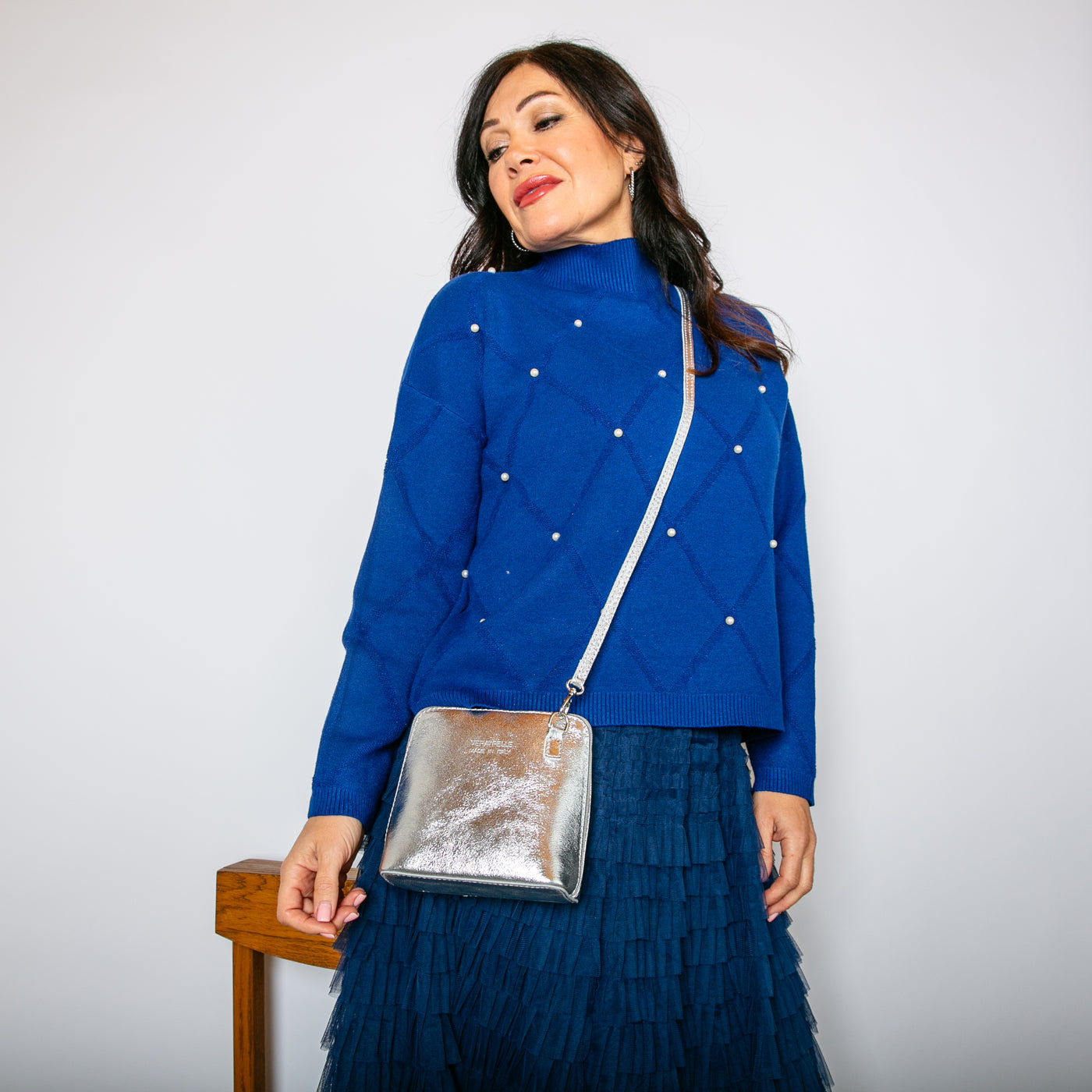 The royal blue Pearl Detail Mock Neck Jumper with long sleeves and a high neckline