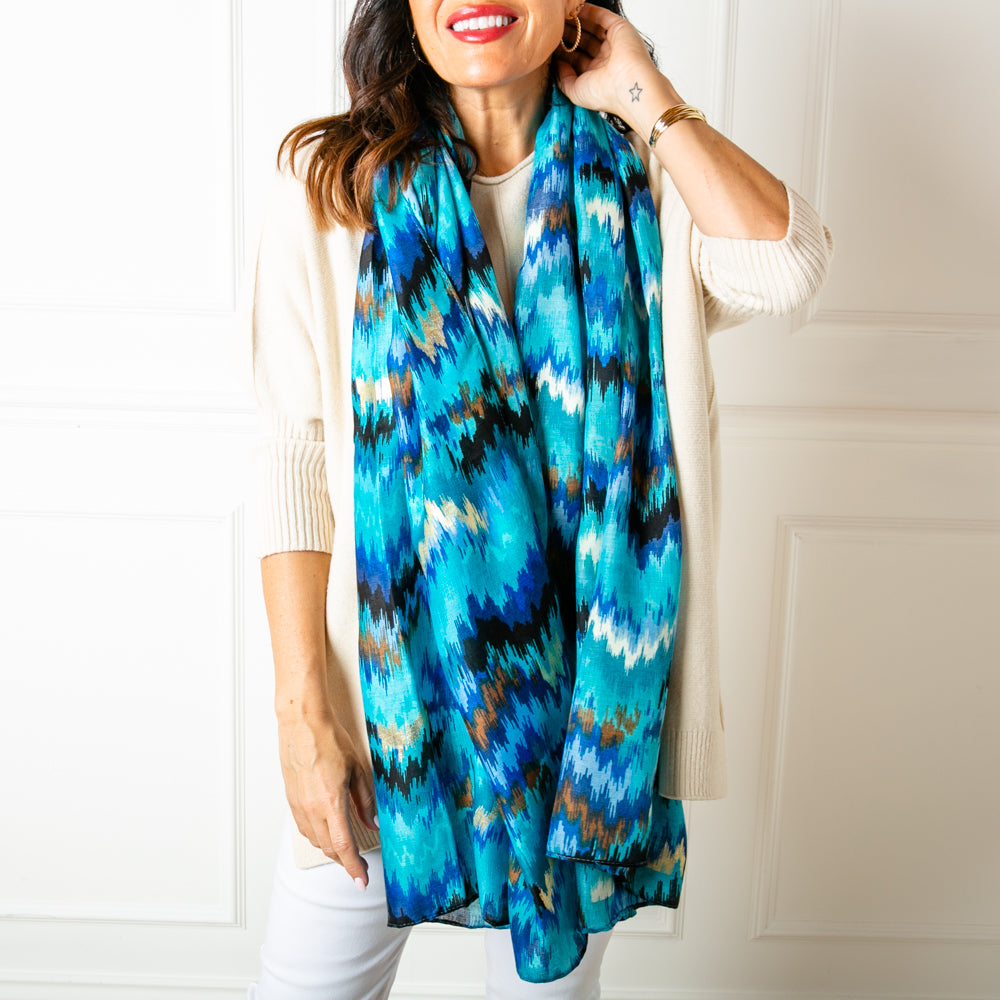 Phoenix Scarf in royal blue featuring a fun abstract zig zag pattern