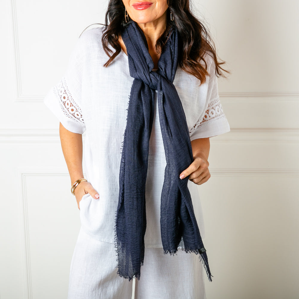 The Plain Summer Scarf in ink blue which can be worn in lots of different ways 