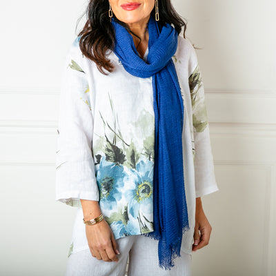 The Plain Summer Scarf in navy blue which can be worn in lots of different ways 