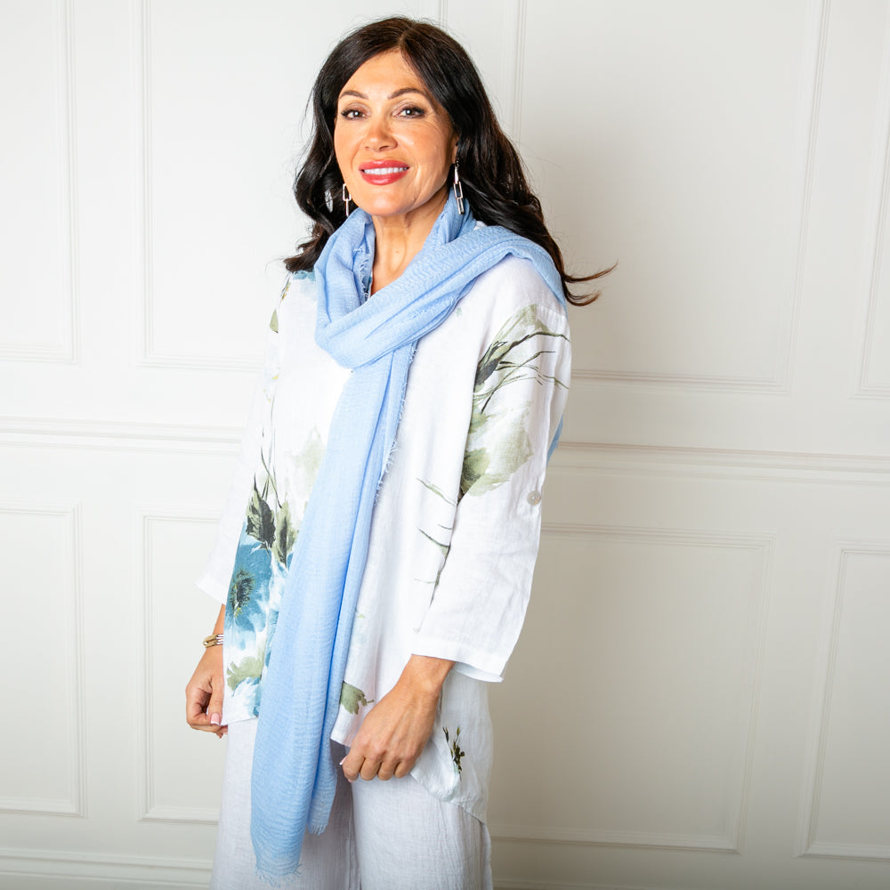 The Plain Summer Scarf in sky blue which can be worn in lots of different ways 