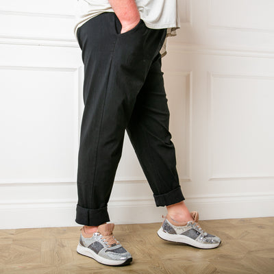 The Plus Size Stretch Trousers in black made from a cotton and elastic blend. the perfect wardrobe staple