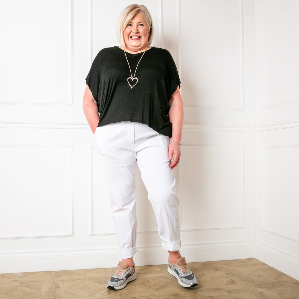 Plus size stretch trousers in white with an elasticated waistband with a drawstring tie detail