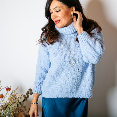 The baby blue Popcorn High Neck Jumper made from a knitted blend of acrylic, wool and alpaca