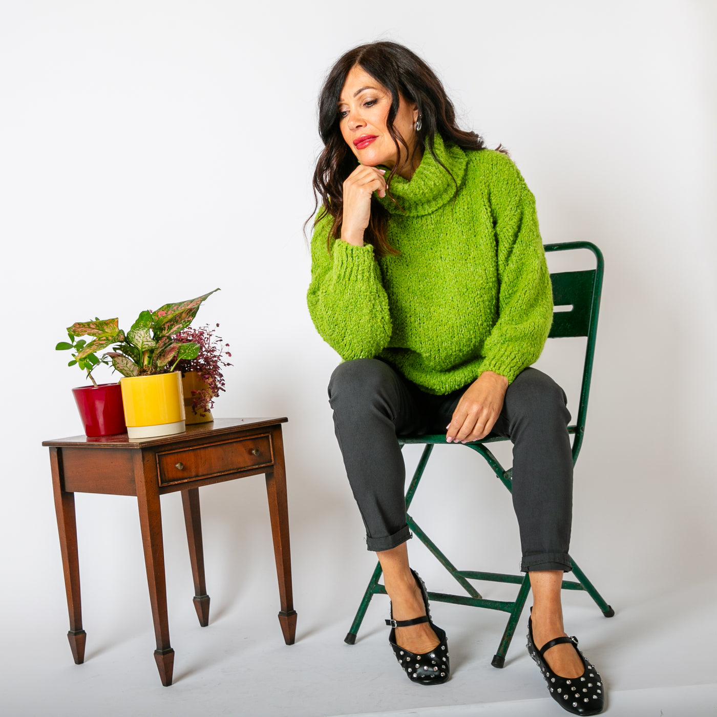 The lime green Popcorn High Neck Jumper with long sleeves and ribbed cuffs