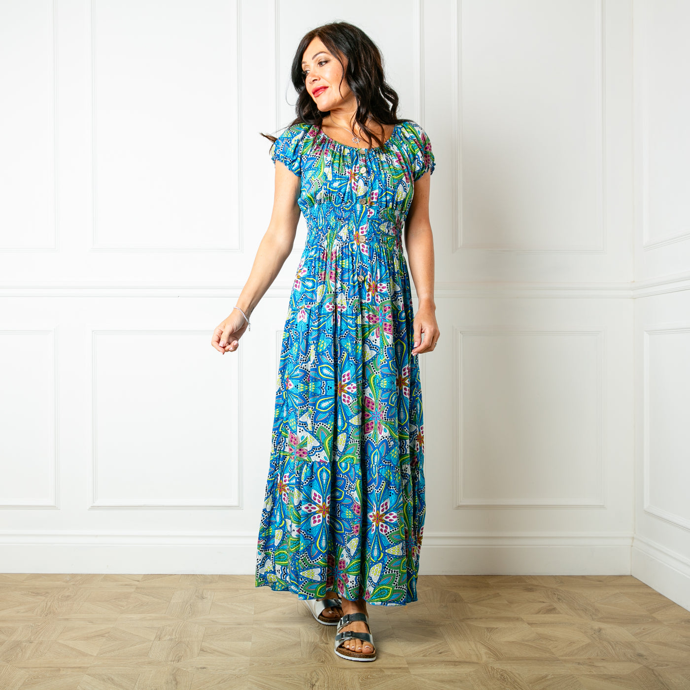 The blue Printed Button Maxi Dress with a maxi tiered skirt in a fun summery pattern