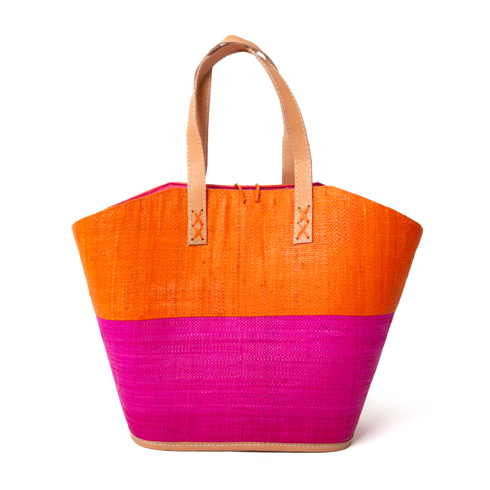 The Raffia Shopping bag in orange and pink handmade from sustainable raffia in Morocco