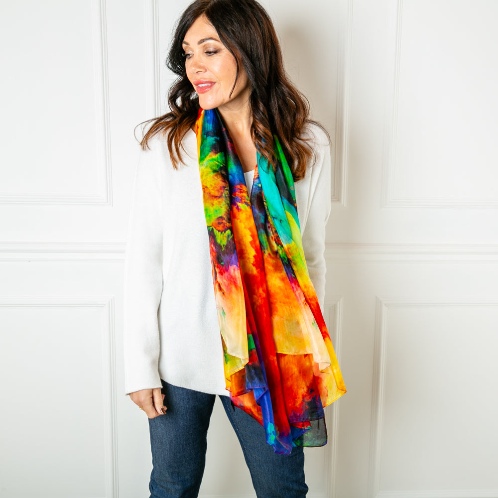 The Rainbow Mist silk scarf which can be worn in lots of different ways
