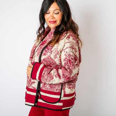 The Berry Red Rainforest Quilted Jacket featuring a gorgeous intricate animal jungle print 