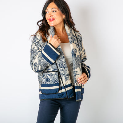 The Navy blue Rainforest Quilted Jacket with long sleeves and a folded over open front