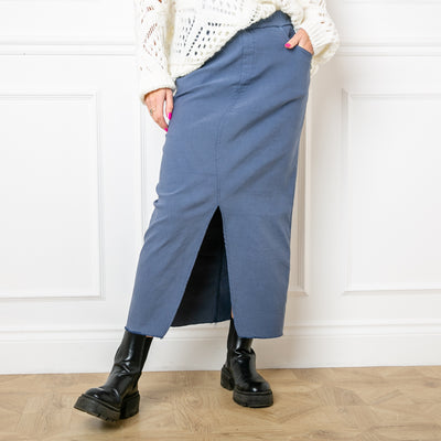 The dusky blue Raw Hem Long Midi Skirt for women with side pockets on the front and larger pockets on the back