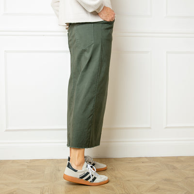 The khaki green Raw Hem Midi Skirt perfect for autumn and winter and very on trend