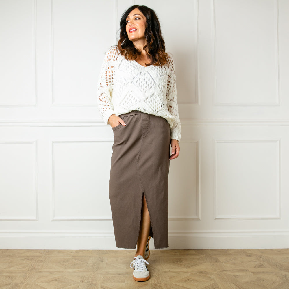 The taupe brown Raw Hem Midi Skirt with an elasticated waist and drawstring detailing like our best selling stretch trousers
