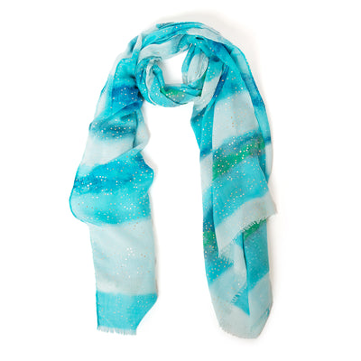 The Reef Scarf in blue made from a super soft lightweight blend of viscose and cotton