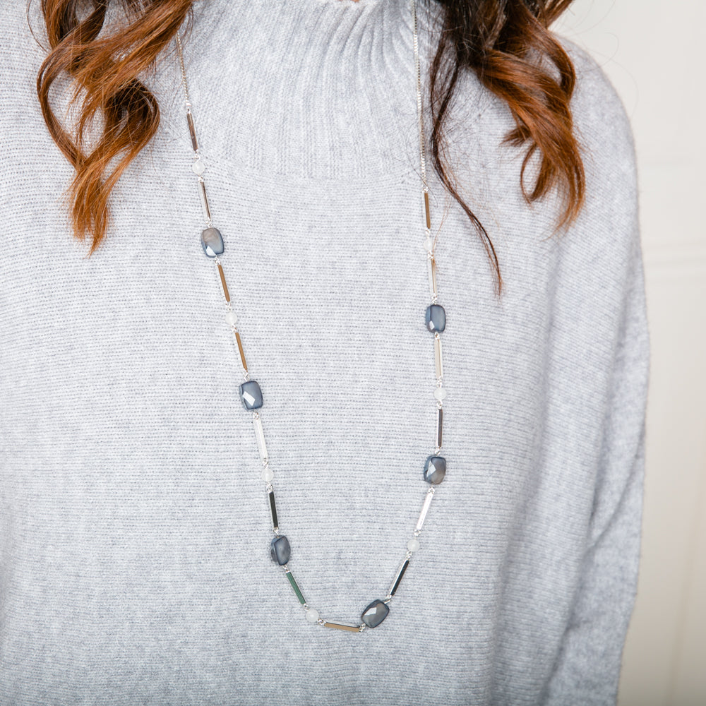 The Rhea Necklace in silver with a long fine chain that can be extended to desired length 
